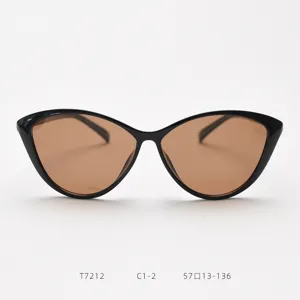 Vintage cat eye sunglasses for women, oversized black frame with brown lenses for styling.