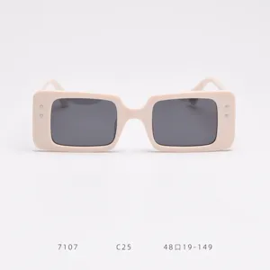 Close-up detail of trendy pink square sunglasses with dark polarized lenses and specs 48-19.