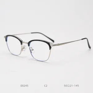 Detailed view of stylish half-rim optical glasses frame with sleek metal temples.
