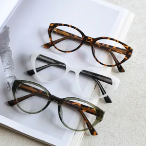 Stylish retro cat-eye eyeglass frames for women, lightweight optical frames in multiple colors.