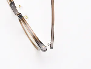 Detailed close-up of retro TR90 optical glasses frame hinge and temple design for women