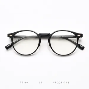 Detailed view of black round TR90 optical glasses frame, lightweight retro eyewear design.