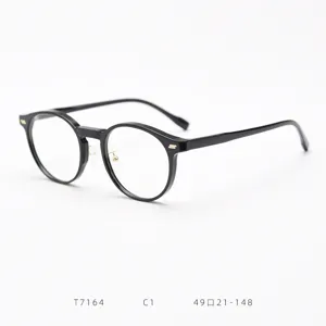 Detailed close-up of the black round TR90 optical glasses frame, showing fine craftsmanship.