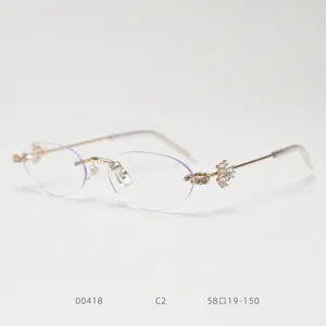 Frameless oval eyeglass frames with crystal rhinestone temples for women fashion street style.