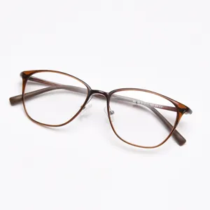 Detail view of brown tortoiseshell optical eyeglass frame, lightweight design for women.