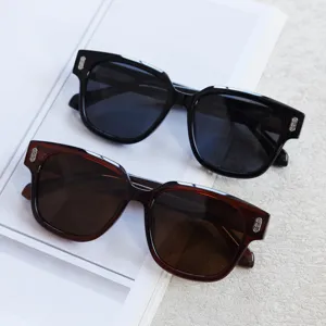 Classic oversized square sunglasses for men and women, stylish polarized retro shades.