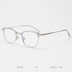 Detailed close-up view of the retro metal optical glasses frame with clear lenses.