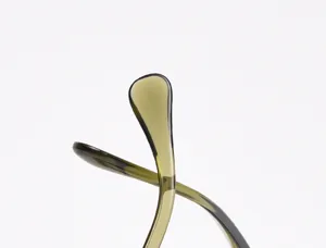 Detailed close-up view of trendy vintage polarized sunglasses temple, stylish design.