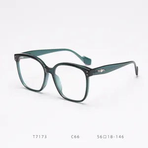 Stylish big frame optical glasses with clear lenses, fashion black and green gradient design.