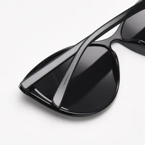 Retro cat eye sunglasses for women, oversized polarized black sun glasses for stylish look.