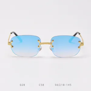 Vintage rimless sunglasses featuring blue gradient lenses and gold textured metal frame.