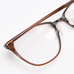 Stylish brown tortoise shell eyeglasses frame for women, lightweight myopia optical glasses.