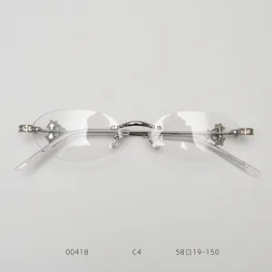 Detailed view of women's rimless oval eyeglasses frame with sparkling rhinestones.