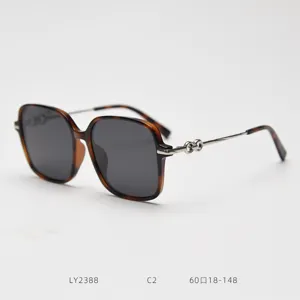 Luxury oversized tortoise shell sunglasses for women with metal temples and stylish design.