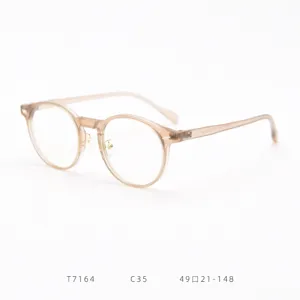 Detailed view of lightweight TR90 round optical glasses frame in translucent light brown finish.