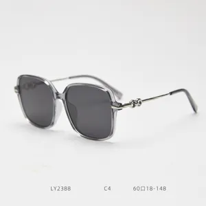 Oversized polarized women sunglasses with grey frame and metal temples. Vintage style.