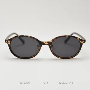 Detailed view of Korean style oval TR90 polarized sunglasses with tortoise shell frame.