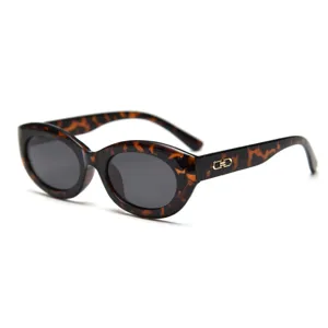 Retro tortoise shell oval sunglasses for men and women, trendy vintage fashion eyewear.