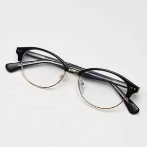Montatura per occhiali mezza montatura retro, design ovale vintage in acetato e metallo.