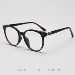 Black round optical glasses frame with stylish metal temple decoration for daily wear and fashion.