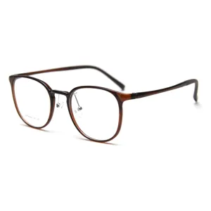 Retro round brown glasses frame for men and women, lightweight plastic steel optical eyewear.
