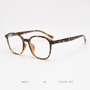 Detail view of the tortoise shell TR90 optical glasses frame, featuring round design and specs.