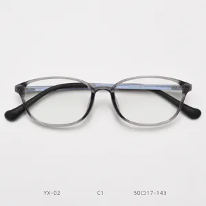 Detail view of TR90 lightweight eyeglass frame in translucent gray with clear lens shape.