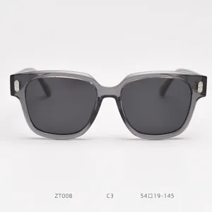 Detailed view of the grey translucent frame polarized sunglasses with stylish metal rivets.