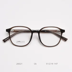Detail view of lightweight TR90 optical glasses frame in transparent brown, size 51-19-147.