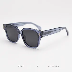 Detail view of the trendy oversized polarized square sunglasses in translucent grey, retro style.