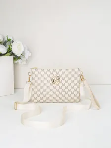 White monogram crossbody bag with gold tone hardware, casual shoulder purse for women.