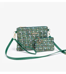 Green tweed crossbody bag set with coin purse and gold hardware, elegant style for use.
