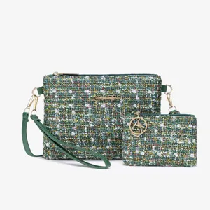 Green tweed crossbody bag and coin purse set with elegant gold hardware and strap for women.