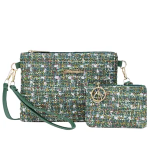 Green tweed crossbody bag set with clutch and coin purse, elegant style with gold hardware.