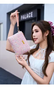 Pink tweed crossbody bag for women, stylish small handbag with wrist strap, trendy design.