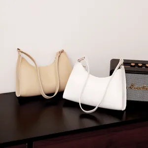 Minimalistische PU Leder unterarm Umhängetasche für Damen, schicke einfarbige Handtasche.