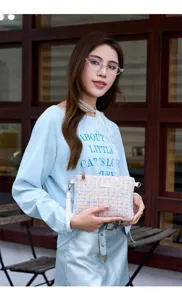 Chic pastel tweed crossbody handbag with delicate hardware, stylish sweet shoulder bag for women.