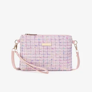 Pink tweed crossbody bag for women, chic woven shoulder handbag with wristlet strap.