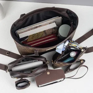 Detailed top-down view of a stylish brown monogram multi-piece tote and handbag set.
