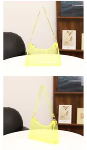 Glänzende transparente neon gelbe Achseltasche Detail, minimalistische Mode Baguette Handtasche.