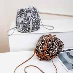 Fashion sequin bucket bag for women, sparkling shoulder crossbody bag with drawstring.