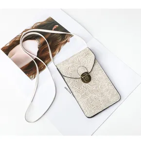 Borsa a tracolla vintage per telefono con stampa floreale, chiusura in metallo e sottile.