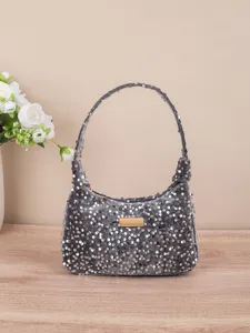 Grijze schoudertas met pailletten voor dames, sprankelende hobo tas met metalen detail voor stijl.