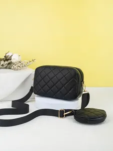 Black quilted crossbody camera bag with coin pouch, wide strap, elegant daily shoulder bag.