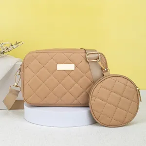 Stylish quilted crossbody camera bag with round coin pouch for women casual daily wear.