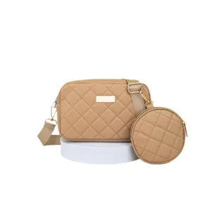 Quilted crossbody bag for women, stylish camera bag with round coin purse and wide strap.