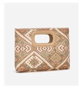 Ethnic woven clutch bag with leather handle stylish casual commuter handbag for women.