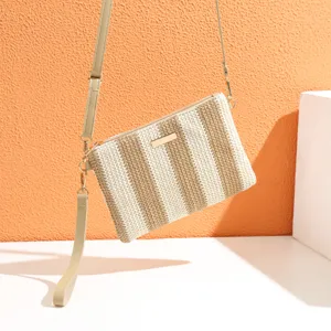 Details of stylish straw woven crossbody bag, casual striped shoulder bag for women.