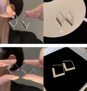 Geometric silver metal earrings featuring V-shape and square designs, chic daily jewelry for women.