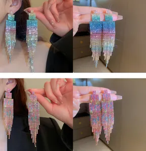 Stunning long rhinestone tassel earrings with vibrant gradient colors, ideal for party wear.